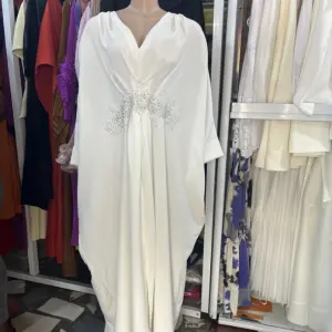 White Long Kaftan Dress designed to combine Luxury and Simplicity