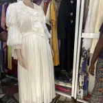 White Long-Sleeved evening Gown suitable for Formal occasions.