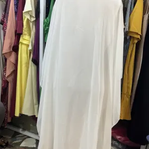 Kaftan-Style Abaya or a loose-Fitting Boubou.