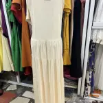 Long-Sleeved, Single-Breasted Pleated Shirt Dress.