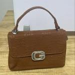 brown monogram top-handle handbag