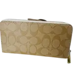 Coach Women's Long Zip Around Wallet in Signature Canvas.