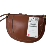 Zara Contrast Topstitching Crossbody Bag with a structured design and adjustable strap.