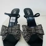 Zara Bow High Heel Sandals in a diamante-encrusted bow on the instep and a side buckle.