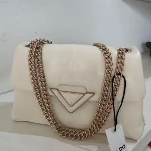 Aldo Softpuff Convertible Flap Crossbody Bag.