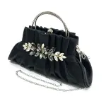 Vintage-inspired Black pleated Evening Clutch in "pouch" Silhouette with Opulent Hardware and Texture.