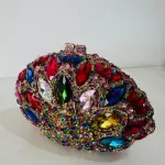 Gemstone-Encrusted Evening Clutch, with a multicolor Mosaic of Large Rhinestones and Crystals in various cuts like oval, teardrop, and marquise.