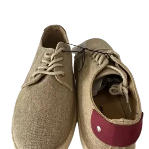 Casual low-top lace-up sneakers, in a textured canvas material.