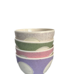 A set of speckled ceramic mixing or serving bowls.